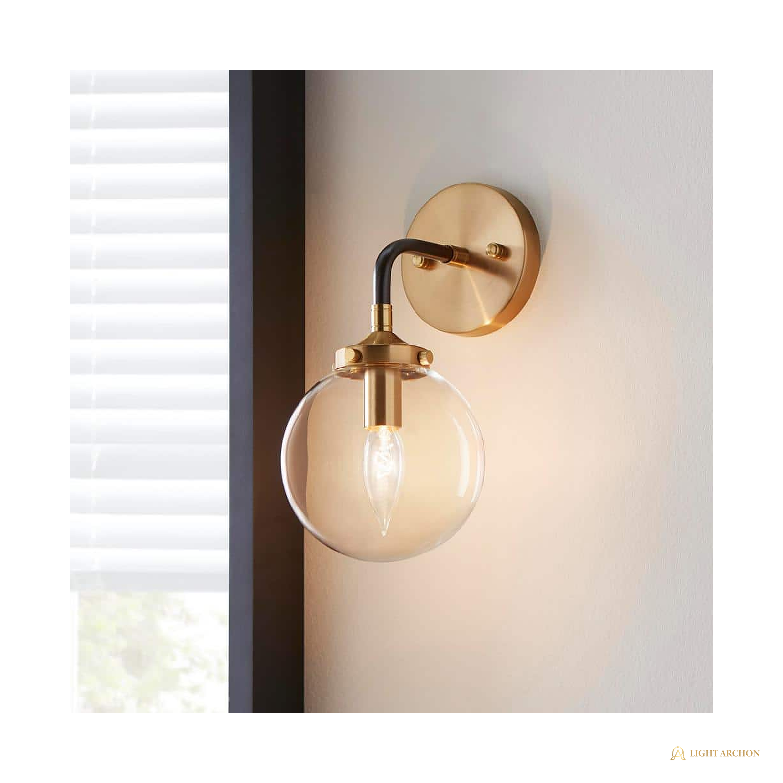 Light Archon Aurum 6 in. 1-Light Wall Sconce with Clear Glass Orb, Matte Black and Antique Gold - front view
