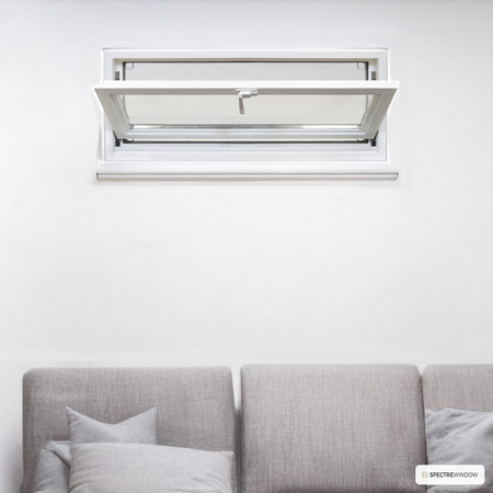 Spectre Window 31.75 in. x 13.75 in. Tilting Vinyl Basement Hopper Window - installed view