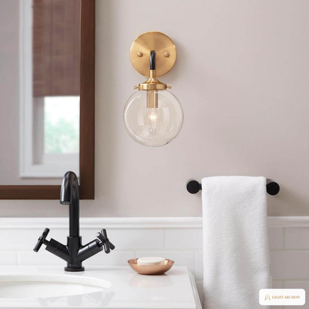 Light Archon Aurum 6 in. 1-Light Wall Sconce with Clear Glass Orb, Matte Black and Antique Gold - installed view