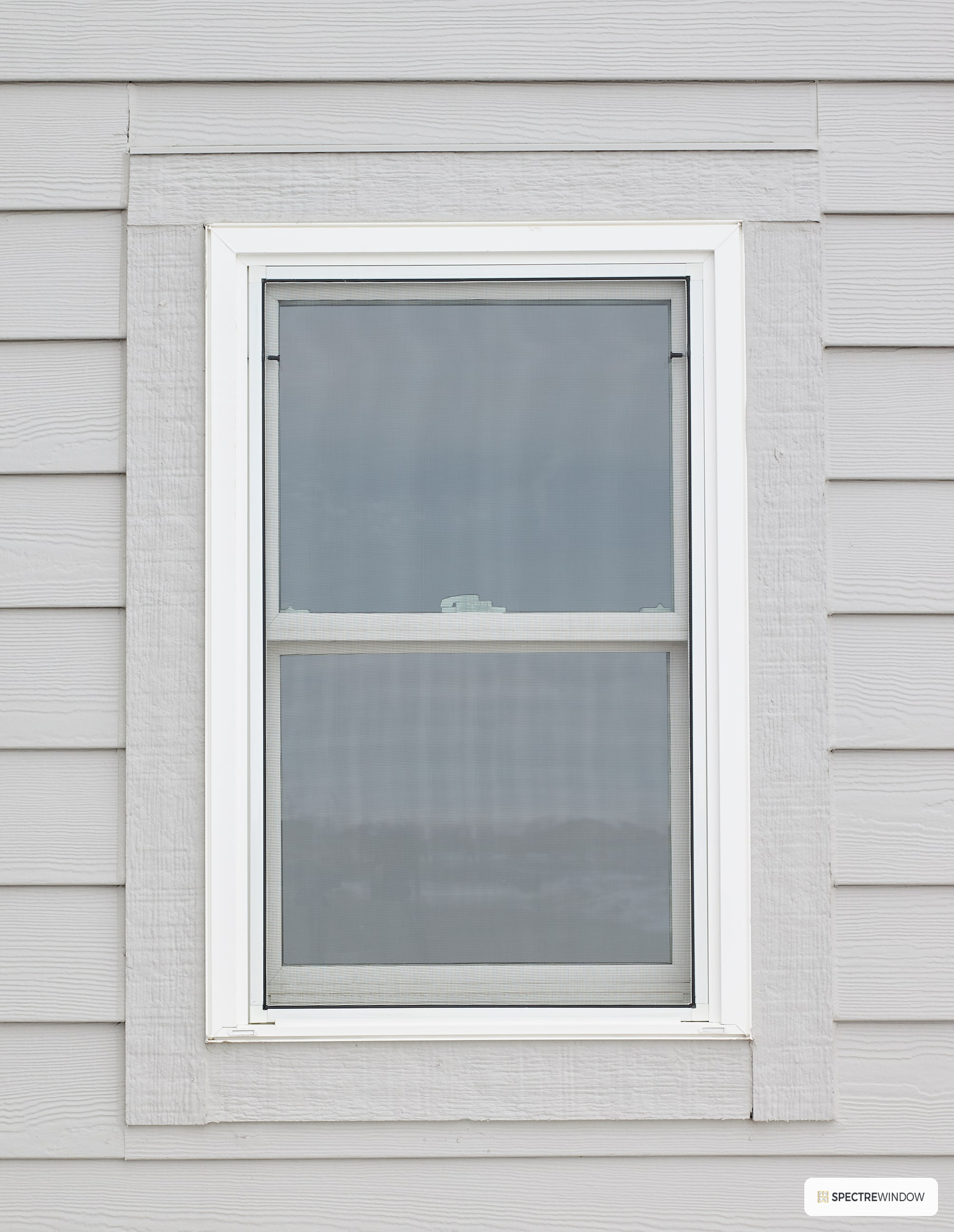 Spectre Window 35.5 in. x 59.5 in. Vinyl Double Hung Window with Low-E Argon Glass and Full Screen - installed view